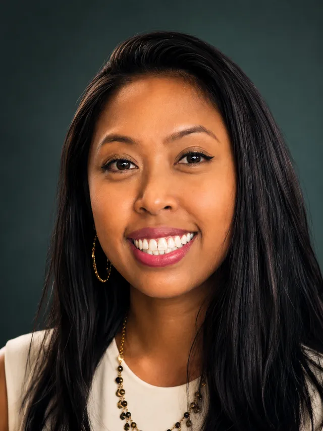 Headshot of Nicole Delrosario.