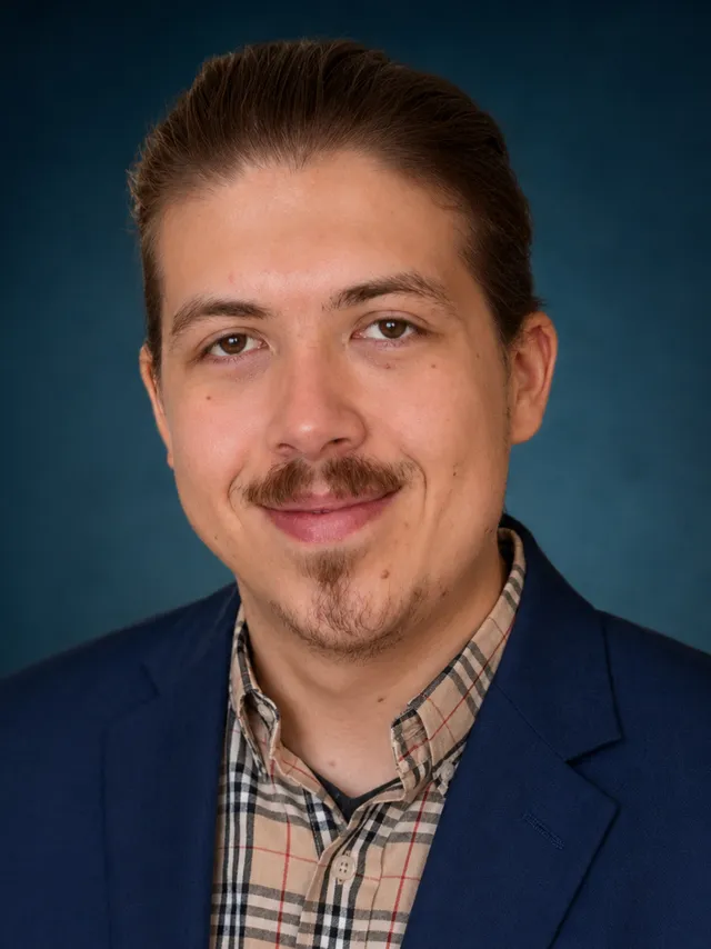 Headshot of Victor Cook IV.